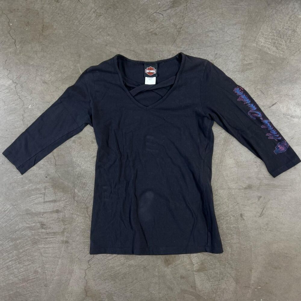 Harley Davidson women’s black long sleeve shirt with blue graphic on the sleeve